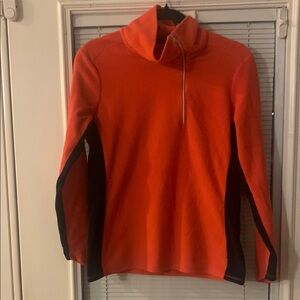 Orange and Black Pullover Hoodie with High Collar and Fitted Silhouette